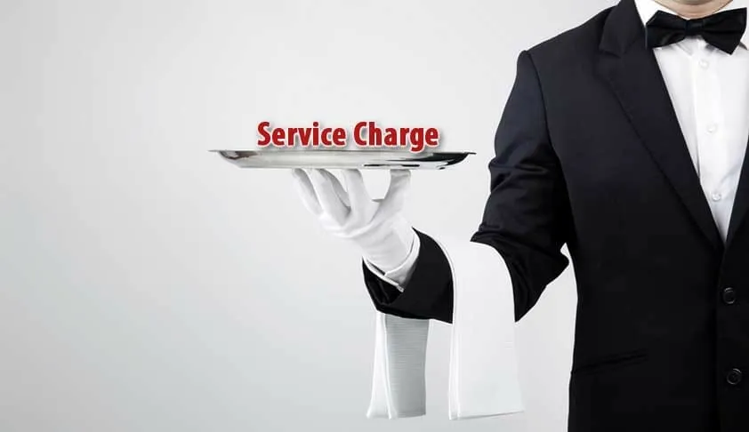 Чайові та service charge за кордоном: як читати рахунок і не платити двічі